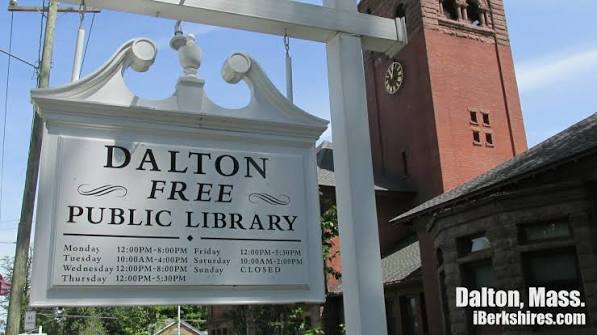 Dalton Free Public Library sign in front of the brick library building